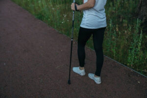 Woman-walking-on-a-serene-woodland-path-symbolizing-the-journey-through-early-recovery-with-addiction-counselling-in-South-Africa.jpg